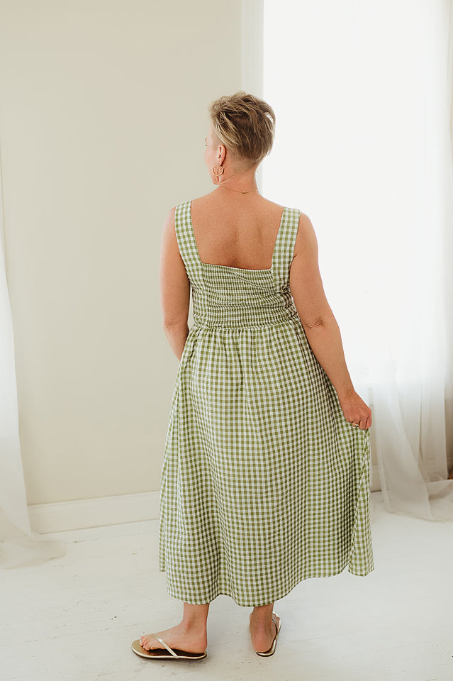 plaid midi dress Freya A waistline with an elastic back and a removable tie closure belt Plaid Wool Midi Dress -
